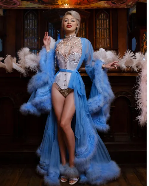 The only thing that was harmed in the making of this was my skin, feathers are so itchy by LilChereBear