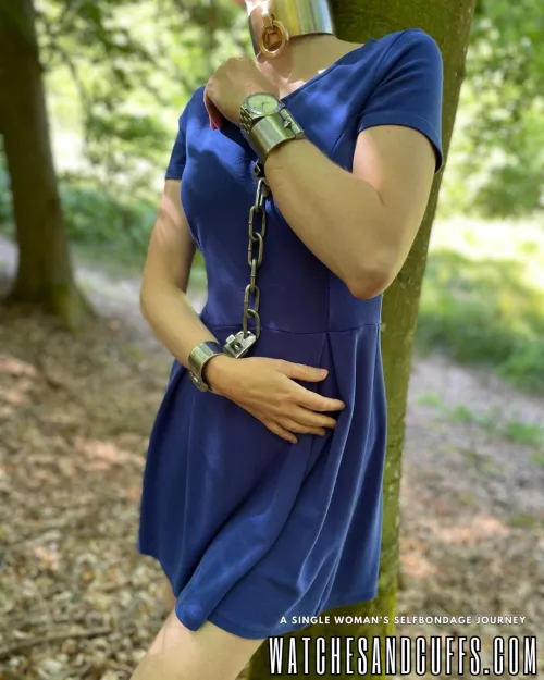 The woods are a great place for some heavy steel restraints! by JessicaShackled