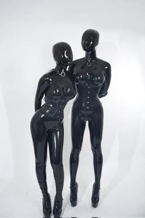They didn't care who was in the house when they broke in. Both you and your wife were taken, covered in latex, and turned into a perfect pair of latex dolls. You were indistinguishable from each other. Just as you should be. Latex removed your individua by sissy_rubberdoll