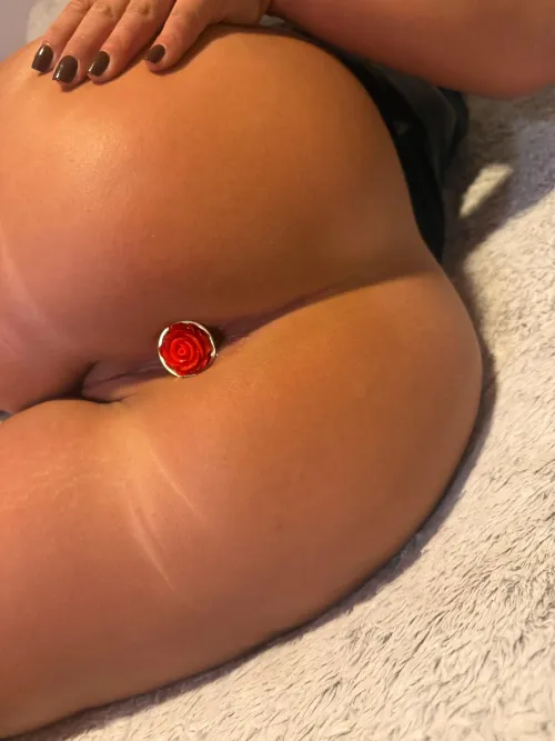 they say life's sweeter when you stop to smell the roses by NaughtyFunCouple44