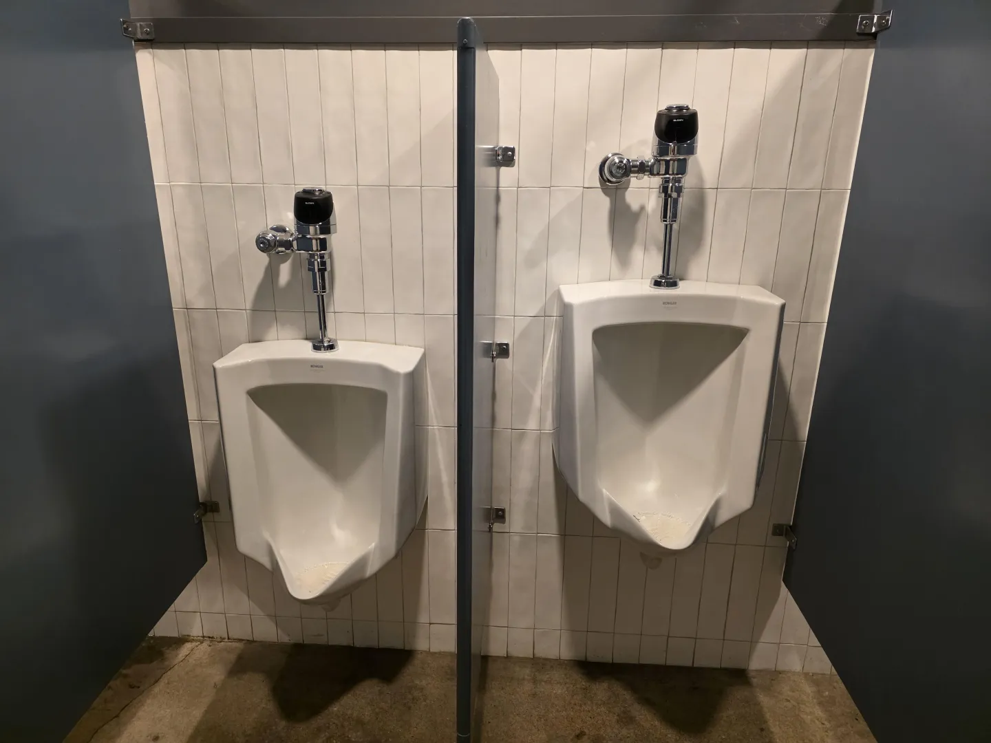 This partition between the two urinals was far too large. posted by No-Anywhere-2756