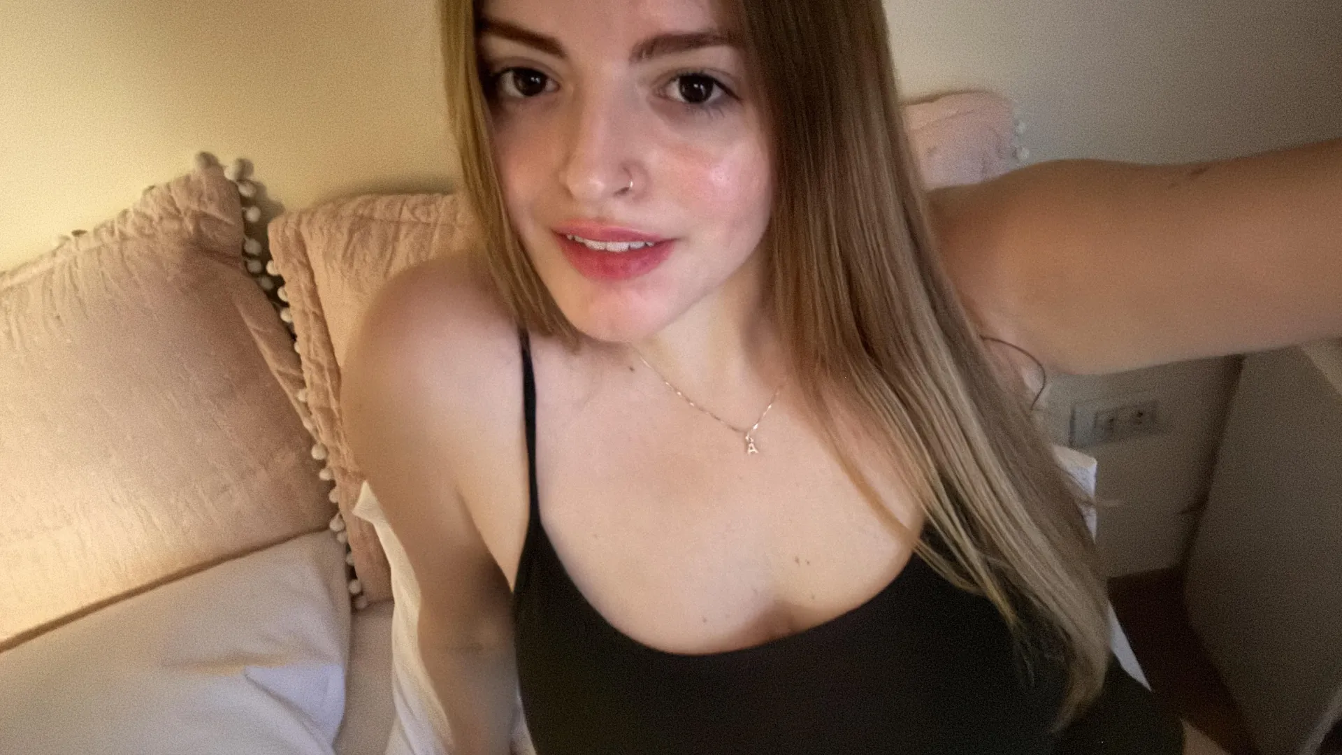 Underneath this tank top are some beautiful breasts posted by Queenagusta