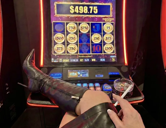 Vacation mode in full effect. Leather boots up, slot spinning, smoke drifting slow. No schedule by heeledobsession