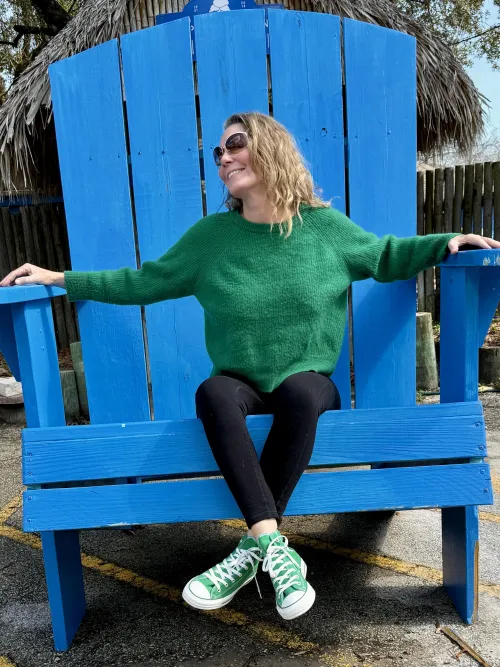 Wearing green chucks in a giant chair. 59yo by Mrseviemae