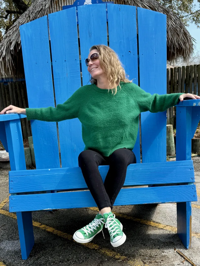 Wearing green chucks in a giant chair. 59yo posted by Mrseviemae