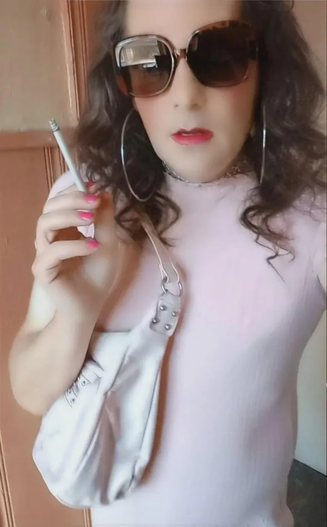 Wearing my pink dress getting ready to go out posted by sissycassie120