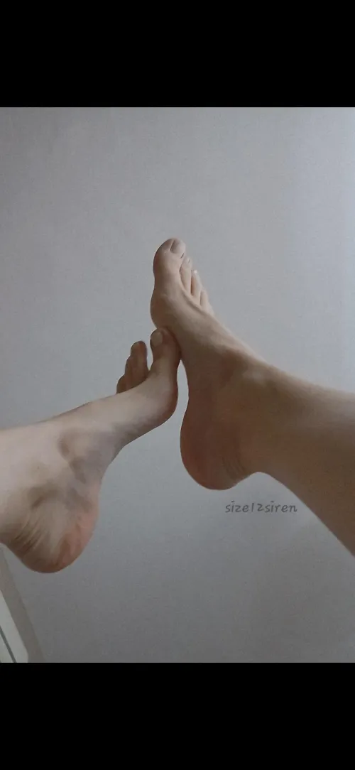 White toes in the air by size12siren