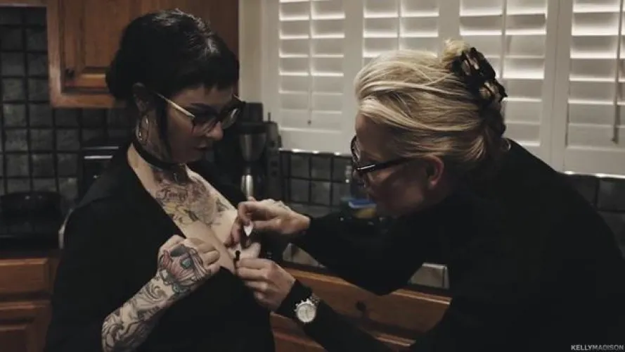 Who's is the lady on the left? by AngryToasterXL