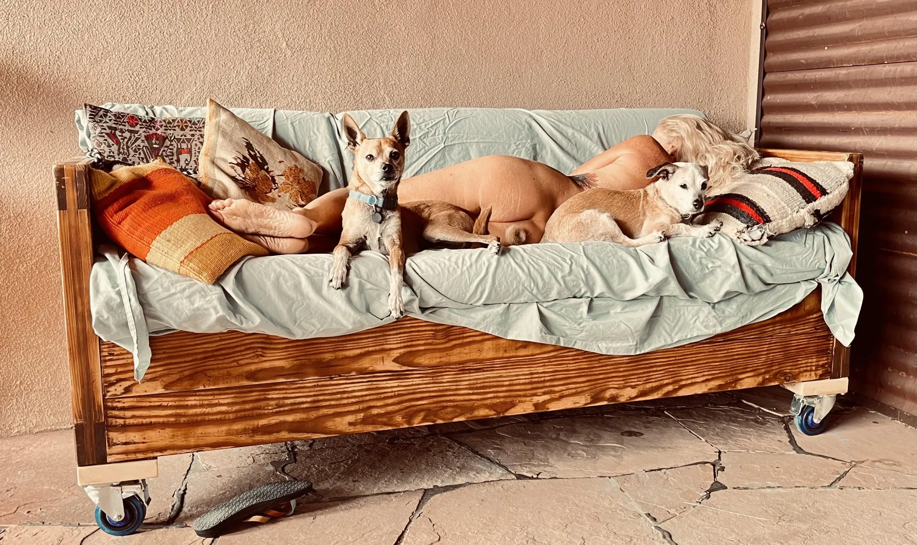 Woman on couch posted by clothingoptionalNM