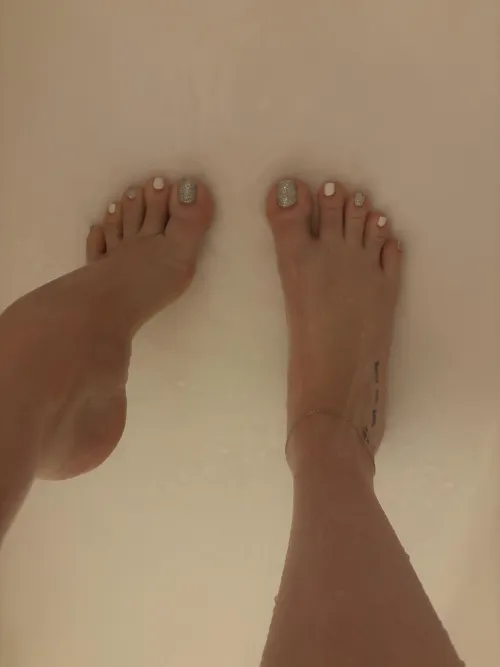 would my feet distract you from your shower? by Brilliant_Second7566