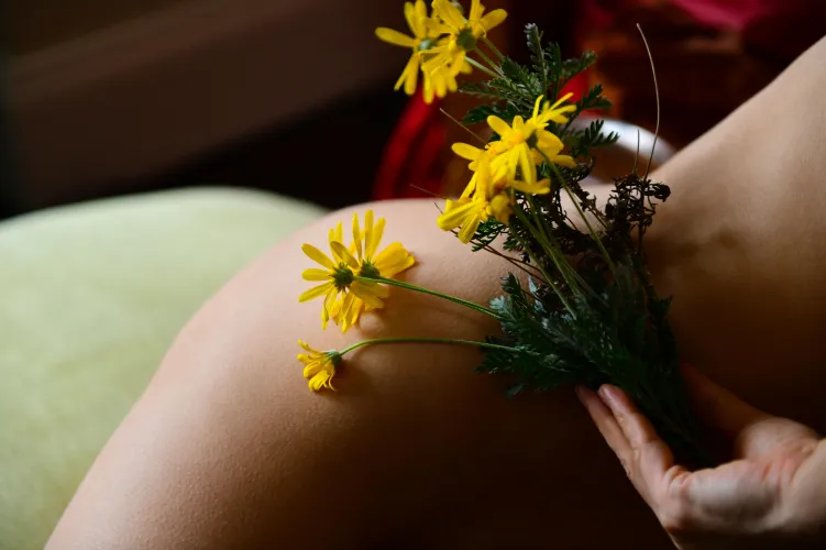 yellow winter flowers and naked skin by MalinaWhispers