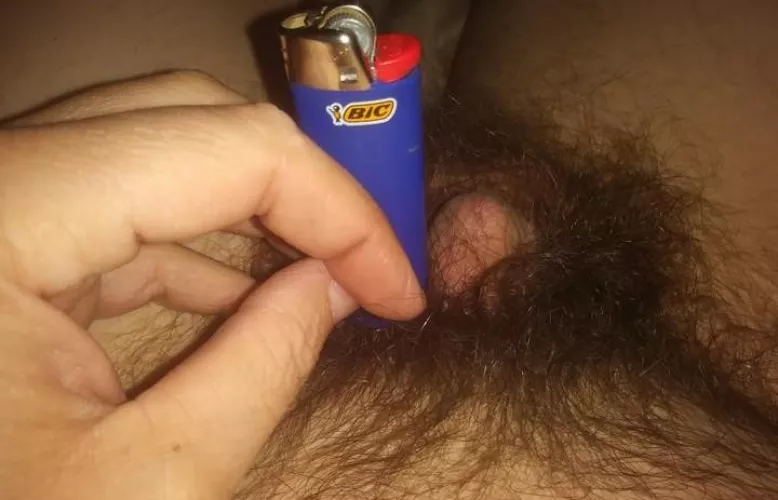 [28] here's my little guy almost all the way solved next to a big bic lighter.. by reichs814