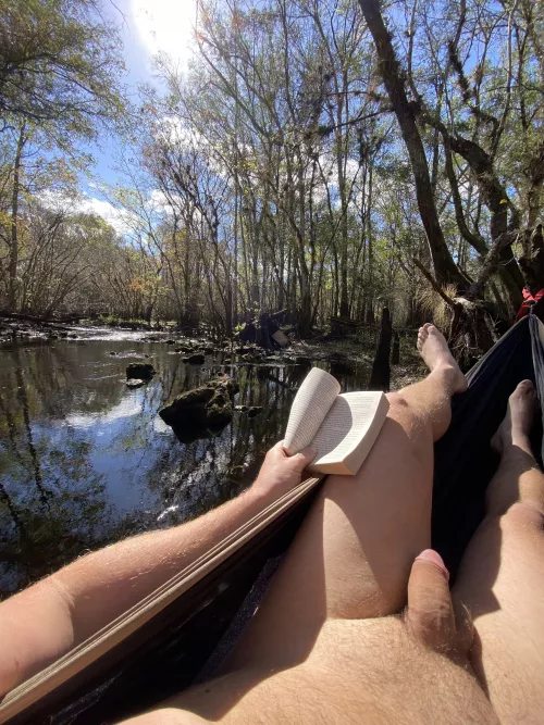 A babbling spring, shining sun, good book and no clothes by nofloexplorer