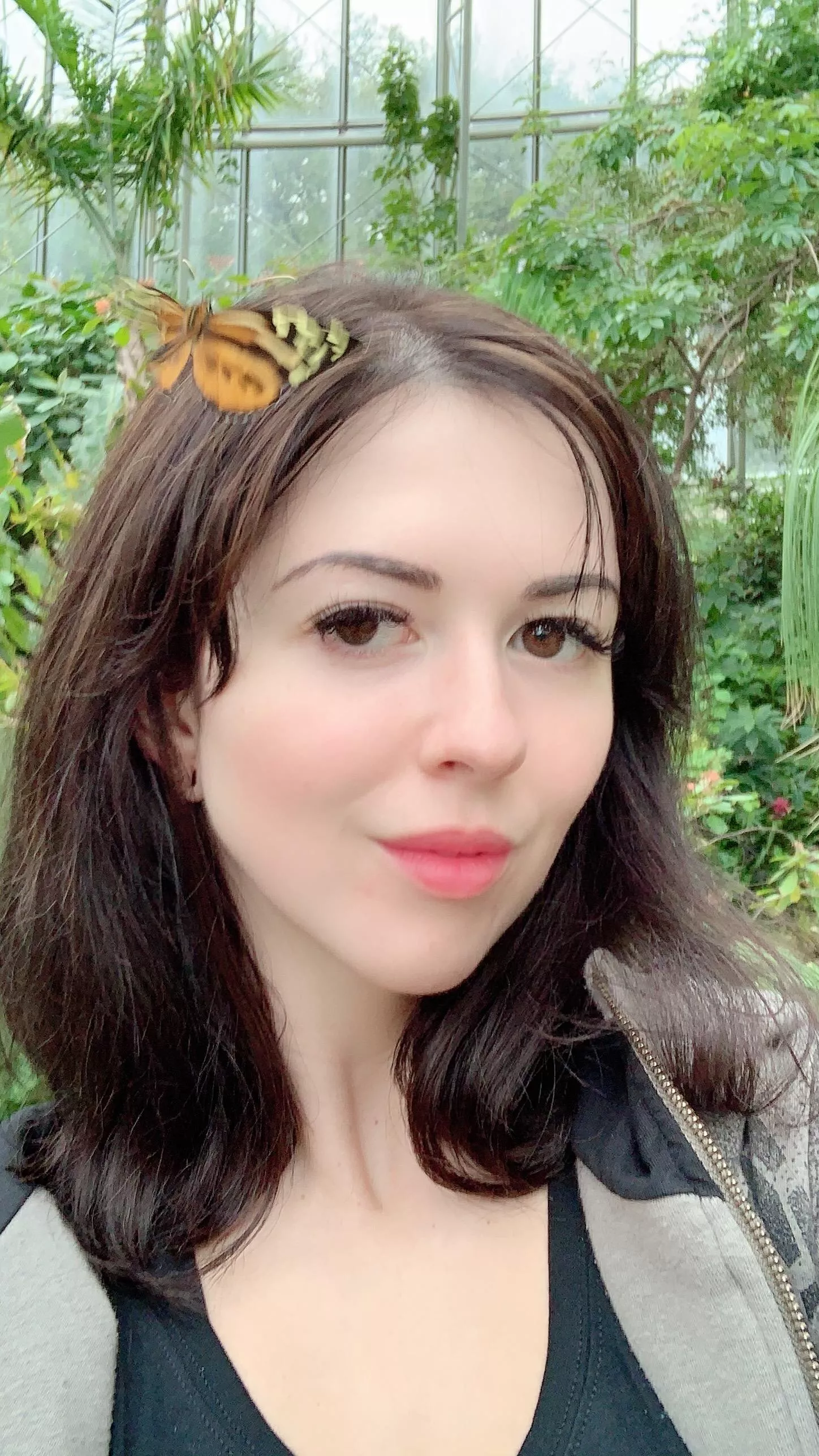 A butterfly landed on my head as I took this selfie at the Houston Museum of Natural Science posted by larkinlovexxx