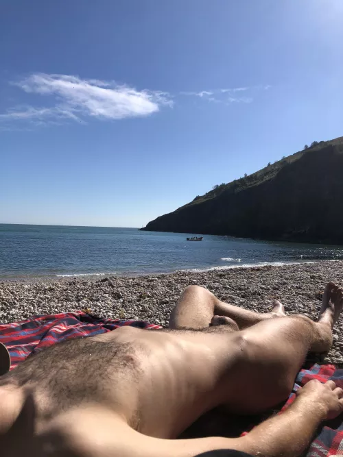 a photo i took of my bf relaxing nude on the beach by devoneater1
