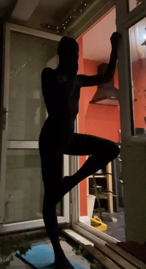 A shadow on the balcony at night by TightAlex