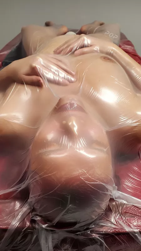 Another angle of me vacuum sealed by PortraitOfPerversion