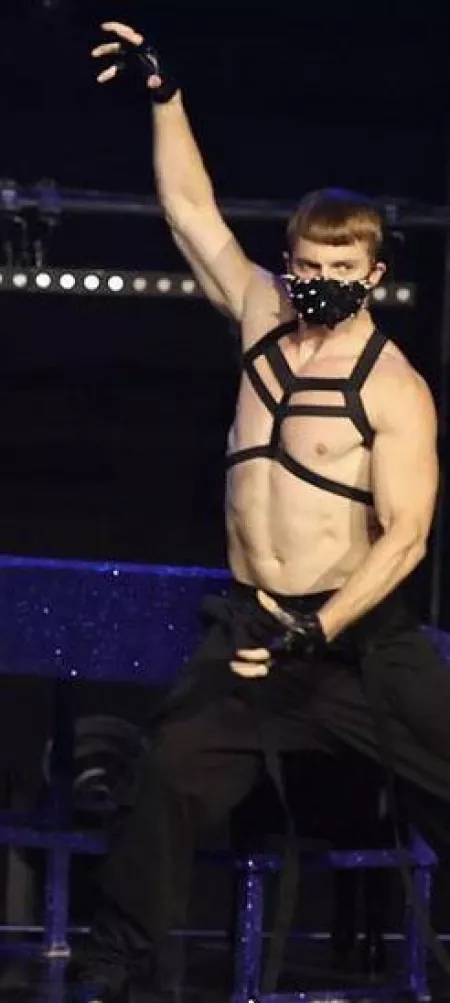 Anyone know who this backup dancer is? Kinda hard to tell with the face mask on. by clank467