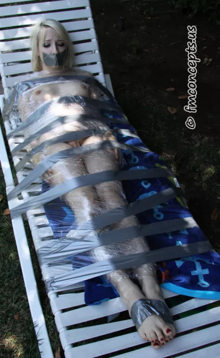 Ashley Jane looks great in tape by pBondage