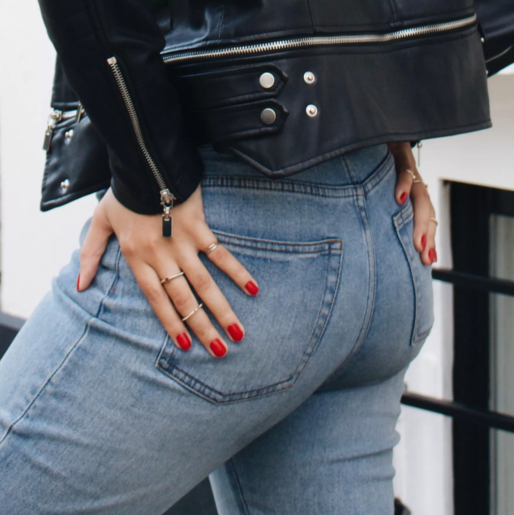 Ass in jeans with red nails and a biker jacket. Like the look? posted by Misscharlierose