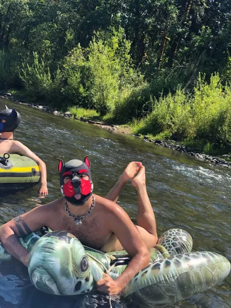 Awrooo! Went tubing down the river . 🐺🖤🐾 paws up ! by HEXicorn