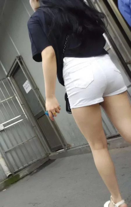 babe showing off her pantylines in white shorts by misosoupdrinker