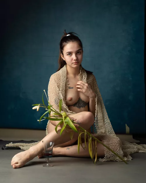 baby caught in a fishing net by libertinart