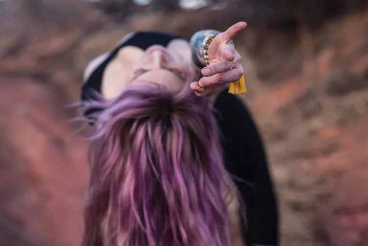 Back bending into the wild thing pose by YogaPhotographer