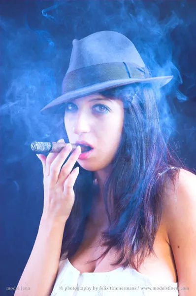 Beauty with a taste for cigars. Got to love it. posted by Spr0de89