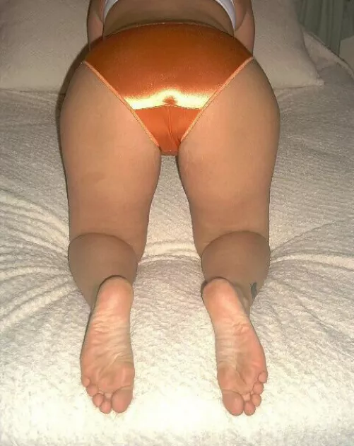 Bent over in orange by panty_overload