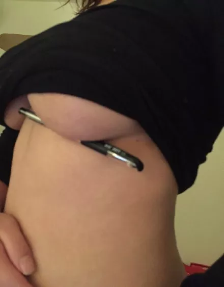 Black top underboob holding pen posted by NSFWNightwood