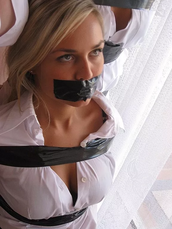 Blonde in tape posted by pBondage
