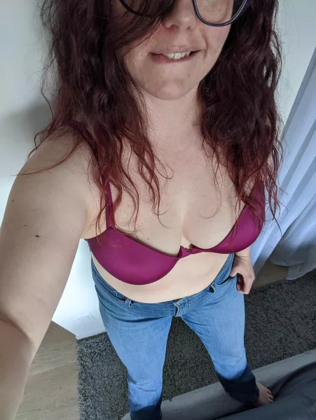 Blue jeans and fuschia boobs. by make_me_a_good_girl