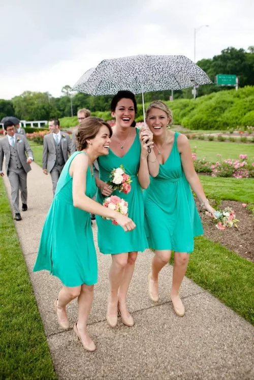 Bridesmaids avoiding the rain by throw_away_1010220