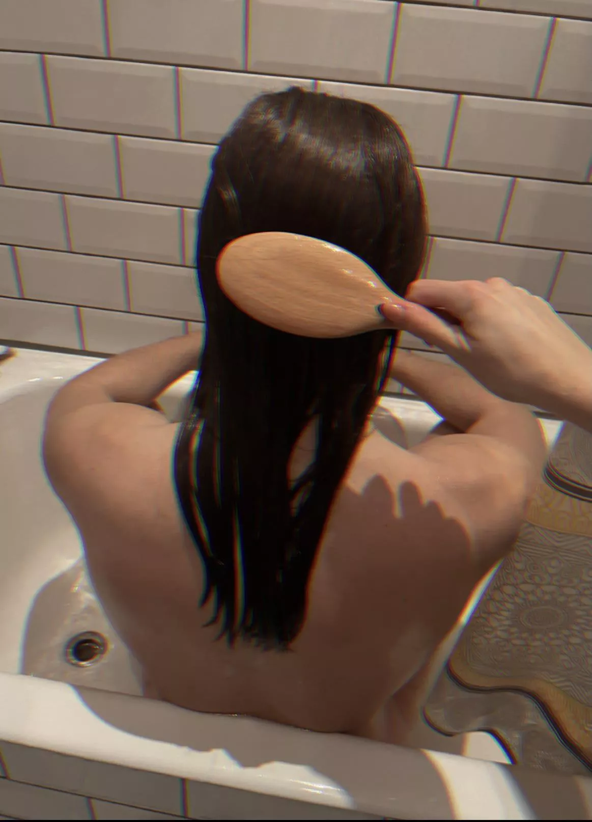 Brushing pet’s hair in a bath 🧼 posted by camillarose_