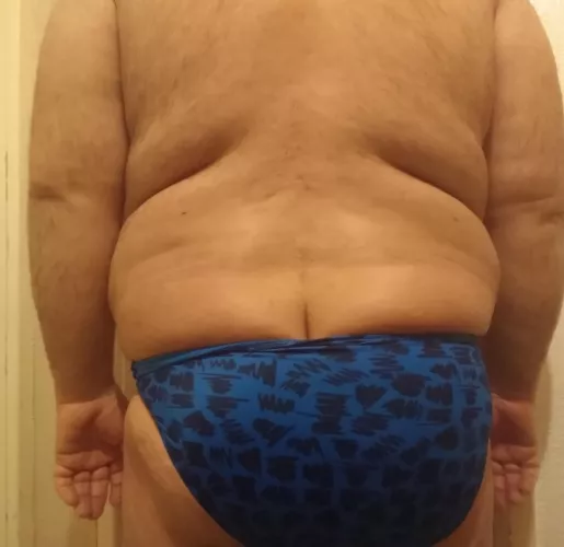 Chub squuezed into swim pantues by ballooningbelly