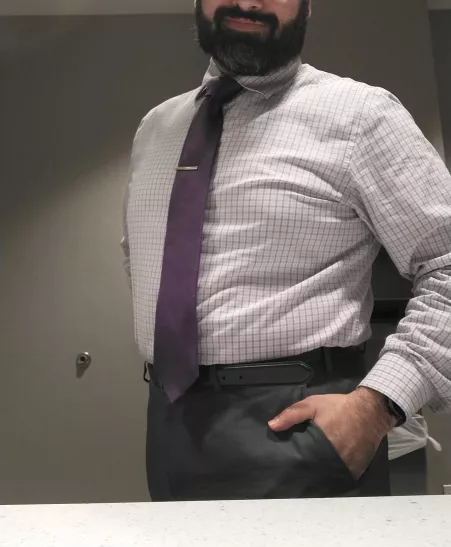 Chubby dude taking selfies at work. by Worried_Storm_7641