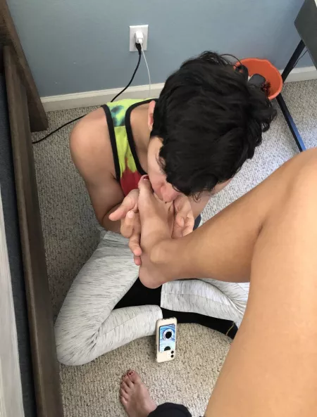 Cleaning the sweat off her feet after we went on a run by [deleted]
