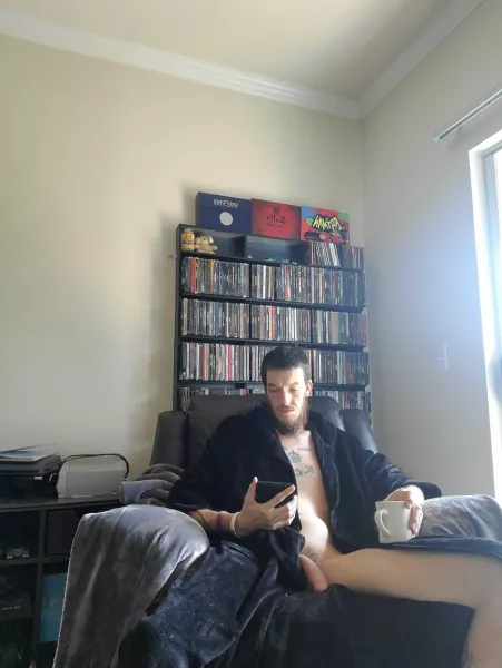 Coffee, a good book, and no clothes. Thats a good day off by evilass666