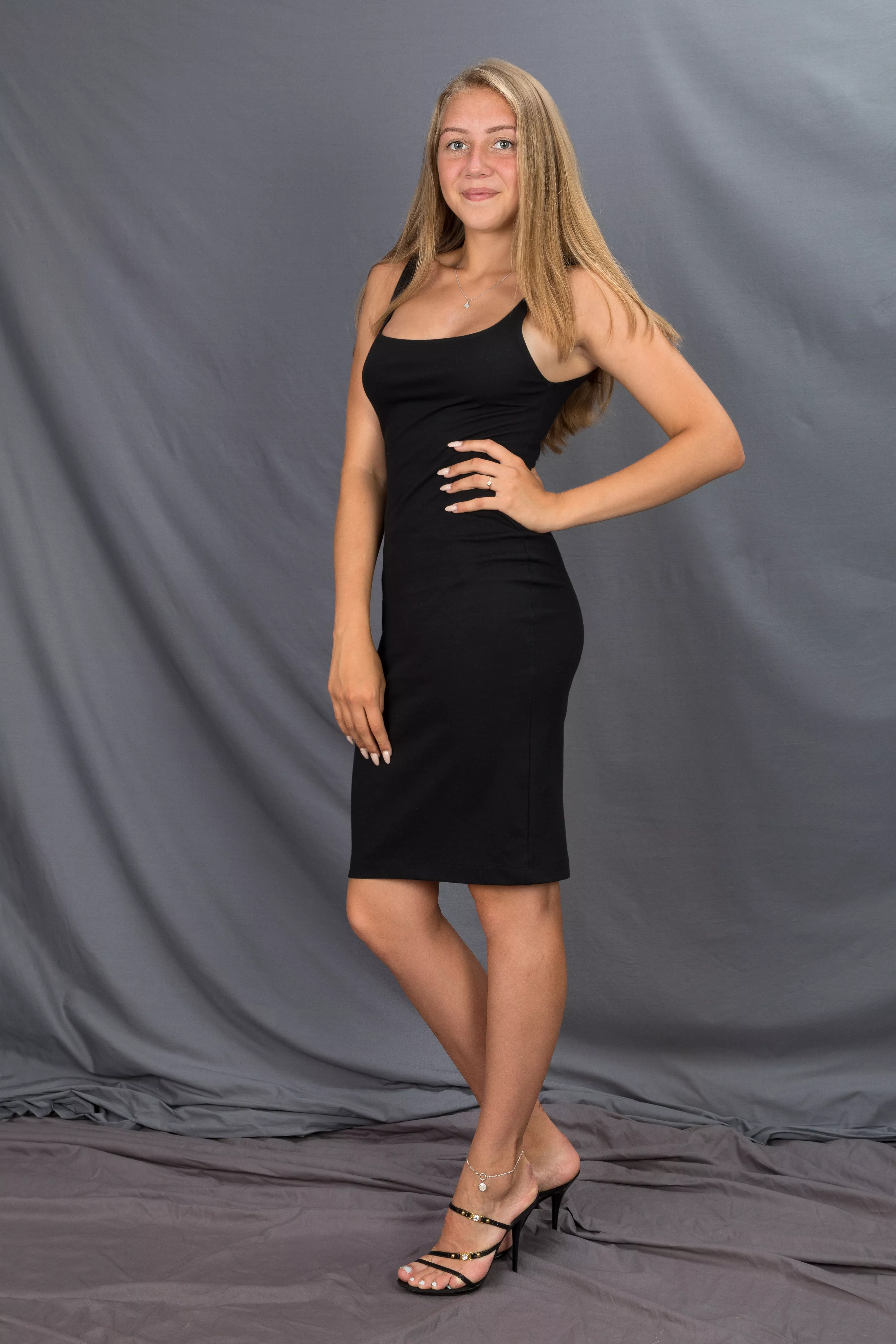 College girl in black dress and heels with anklet posted by sexyfeetexpo