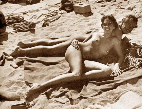 Couple suntanning by NaturistPictures