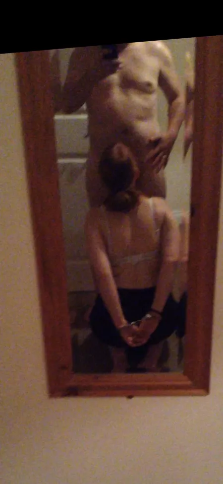 Cuffed in the mirror by iheartlasagne