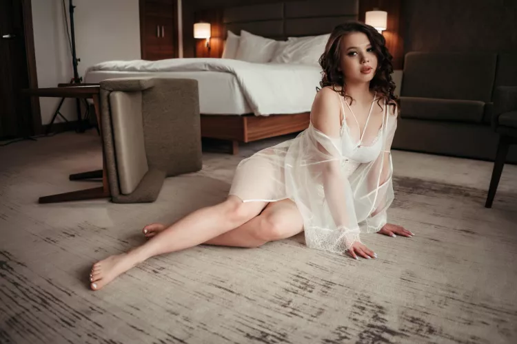 Cute Asian babe with curly hair and a sexy white outfit by XLoveCam