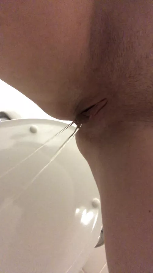 Cute double piss stream in public bathroom