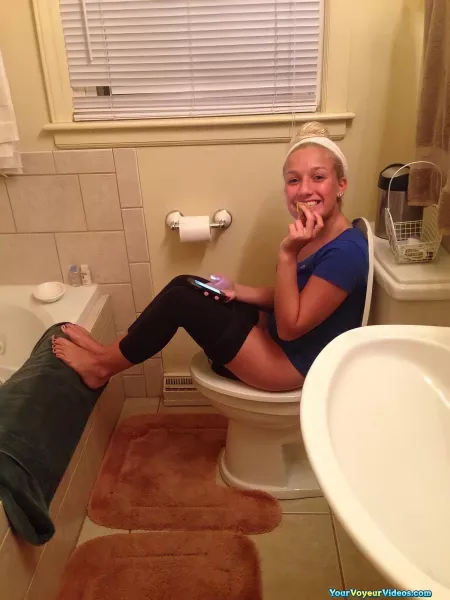 cute girl caught lounging on the toilet by HoverPee