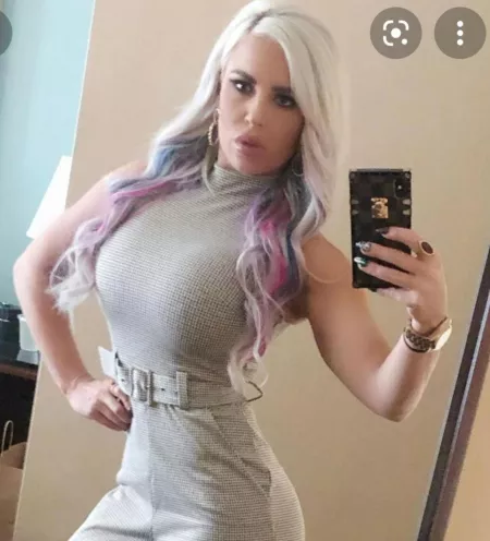 DDana showing her slim waist but massive cleavage by MaleficentBus8