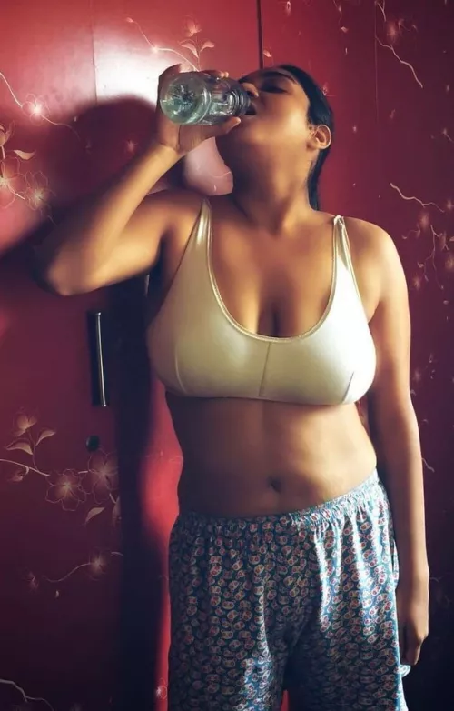 Desi lady taking a water break. by Huddlestone