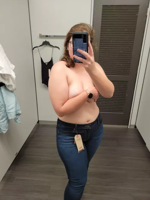 Dirty mirror, tag hanging... seems like a good dressing room picture by artemisfinds