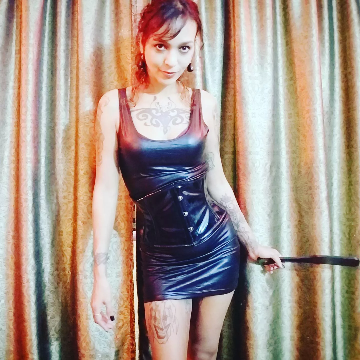 Do you like the sadistic smile that accompanies this sexy corset? I must be thinking naughty thoughts.. posted by painalpeggy