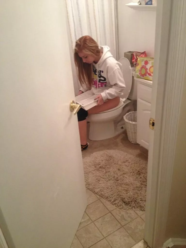 Doing her homework, perhaps? posted by CatpainTpyos